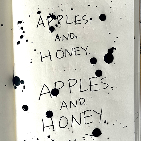 apples. and. honey. handstyle with ink splatters